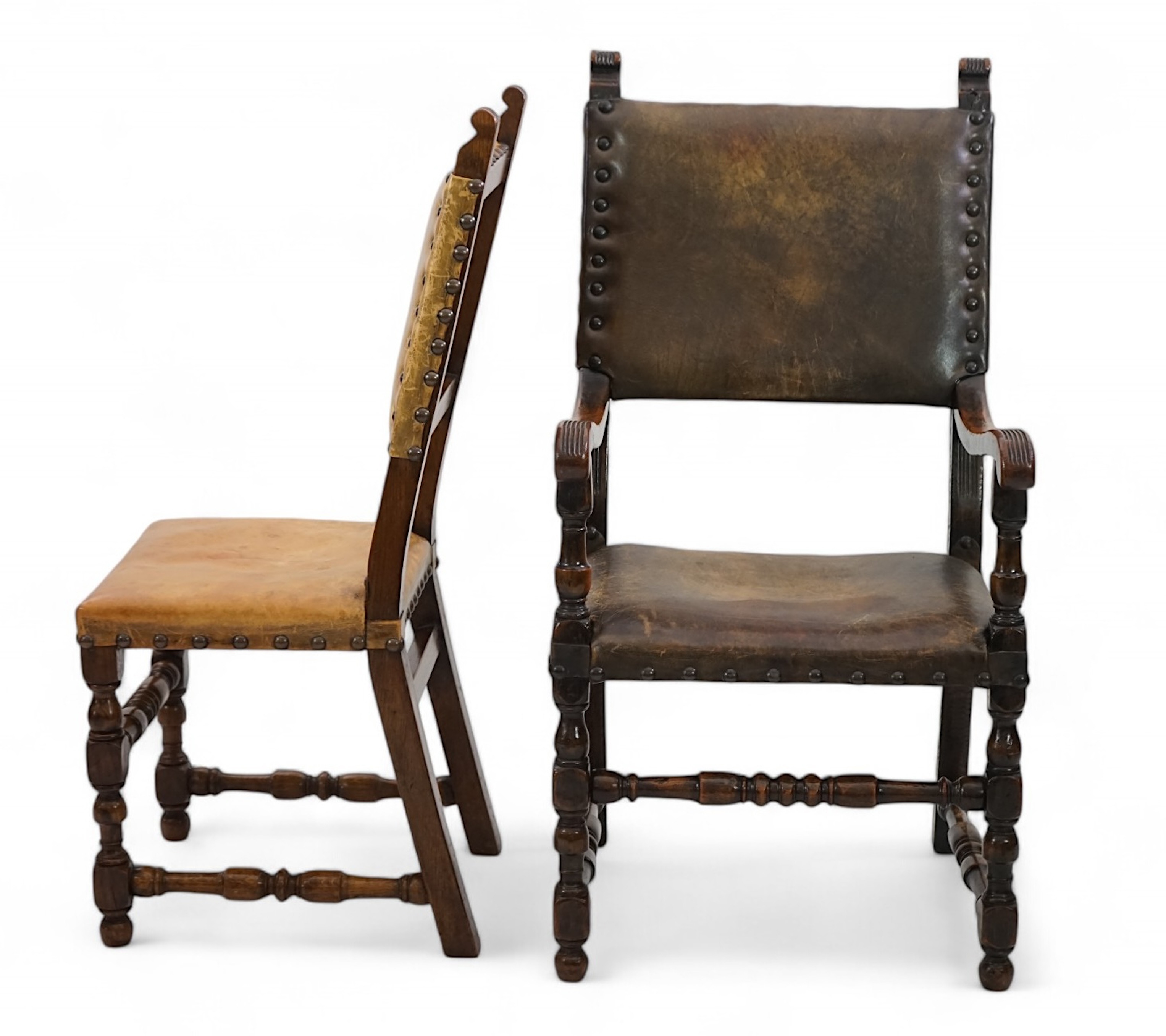 A set of fourteen 17th century style oak dining chairs including a pair of carvers